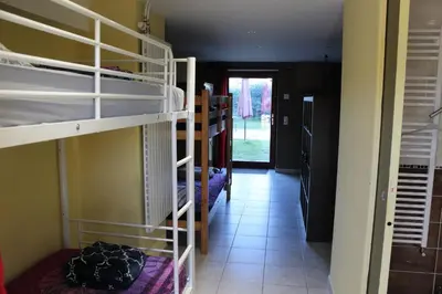 Un ou plusieurs lits superposés dans un hébergement de l'établissement Le Fauverney Lodge