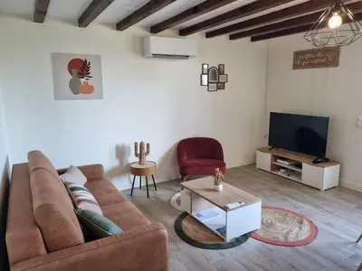 Télévision ou salle de divertissement dans l'établissement Au Marlézay country house 4 personnes