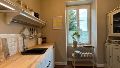 Cuisine ou kitchenette dans l'établissement Maison Belle Vie