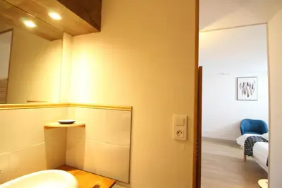 Salle de bains dans l'établissement Le Colombier