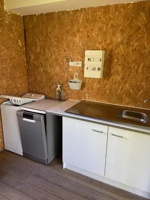 Cuisine ou kitchenette dans l'établissement Le Cèdre