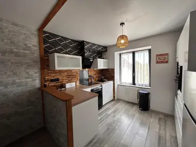 Cuisine ou kitchenette dans l'établissement Maison de vacances avec terrasse - 6 personnes