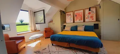 Un ou plusieurs lits dans un hébergement de l'établissement La Popinette Chambre d'hôte