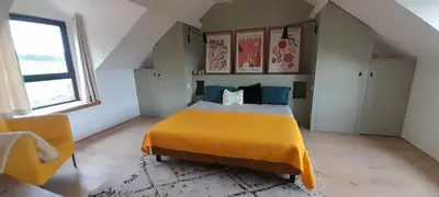Un ou plusieurs lits dans un hébergement de l'établissement La Popinette Chambre d'hôte