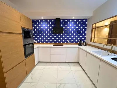 Cuisine ou kitchenette dans l'établissement Le secret du Damier by Miss K
