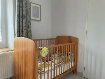 Un ou plusieurs lits dans un hébergement de l'établissement Gite Le Nid Abord