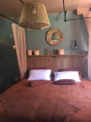 Un ou plusieurs lits dans un hébergement de l'établissement Cottage Mary Château de ragny
