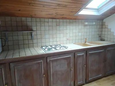 Cuisine ou kitchenette dans l'établissement Le Loft