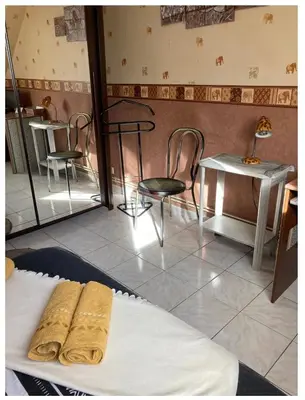 Coin salon dans l'établissement Chambre chez l habitant proche gare