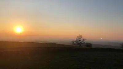 Lever ou coucher de soleil vu de la maison de vacances ou à proximité