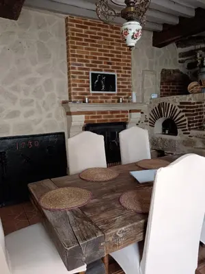 Coin salon dans l'établissement Maison au bord de l'eau
