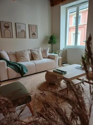 Coin salon dans l'établissement L'Appartement Pasteur