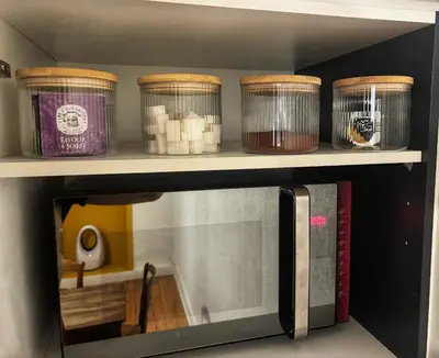 Cuisine ou kitchenette dans l'établissement Chez Kapameï