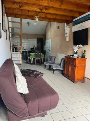 Coin salon dans l'établissement La maison des vendangeurs