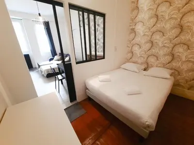 Un ou plusieurs lits dans un hébergement de l'établissement Le Buffon - Apt 2 Personnes, 1 ch, Centre ville