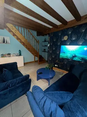 Coin salon dans l'établissement Le 8 appartement - Le Duplex III - parking sur demande