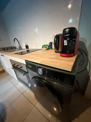 Cuisine ou kitchenette dans l'établissement Le 8 appartement - Le Duplex III - parking sur demande