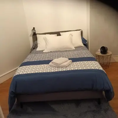 Un ou plusieurs lits dans un hébergement de l'établissement Maison de village au calme 4 chambres