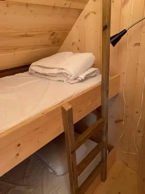 Un ou plusieurs lits dans un hébergement de l'établissement Trappeur du Camping la Saline d'Arc et Senans