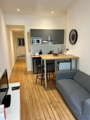 Cuisine ou kitchenette dans l'établissement Studio au centre ville de Dole