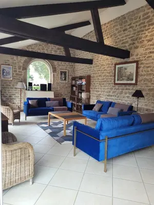 Coin salon dans l'établissement Maison du parc - Château de Musigny