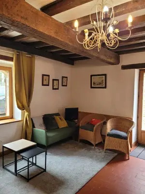 Coin salon dans l'établissement Les Lavandins Château de Musigny
