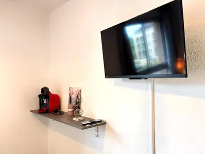 Télévision ou salle de divertissement dans l'établissement Studio N216 Quiet and functional