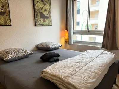 Un ou plusieurs lits dans un hébergement de l'établissement Studio N216 Quiet and functional