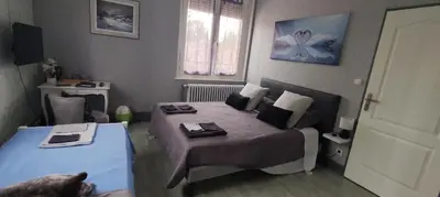 Télévision ou salle de divertissement dans l'établissement Notre Doux Logis