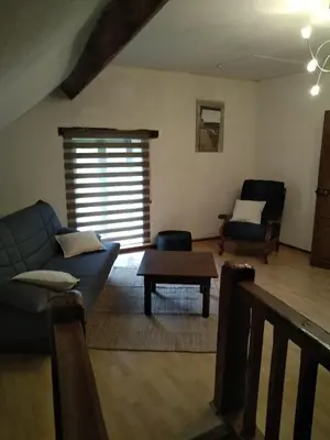 Coin salon dans l'établissement Gîte Le Cabanac
