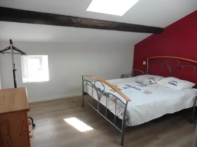 Un ou plusieurs lits dans un hébergement de l'établissement Appartement cosy au calme