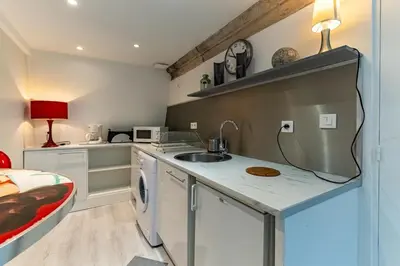 Cuisine ou kitchenette dans l'établissement Le Nid - Duplex