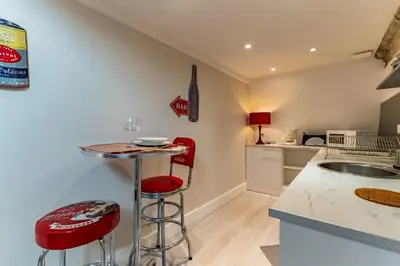 Cuisine ou kitchenette dans l'établissement Le Nid - Duplex