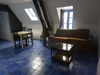 Coin salon dans l'établissement Logement centre Quarré les Tombes