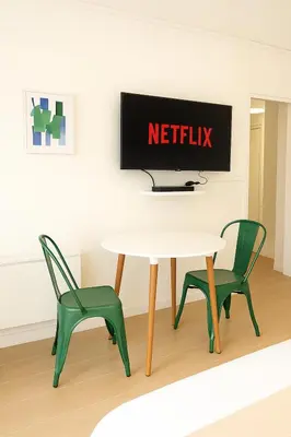 Télévision ou salle de divertissement dans l'établissement Le Botanic - Appartement de charme à Digoin