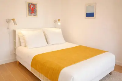 Un ou plusieurs lits dans un hébergement de l'établissement Le Blue Hole - Appartement de charme Digoin