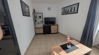 Télévision ou salle de divertissement dans l'établissement Le Bedugue