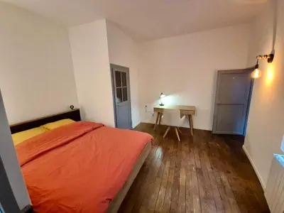 Un ou plusieurs lits dans un hébergement de l'établissement L'aparté Dijonnaise Hypercentre Dijon Darcy