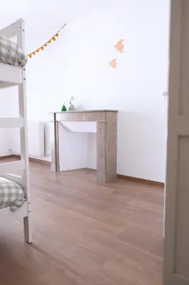 Un ou plusieurs lits dans un hébergement de l'établissement La Petite Maison
