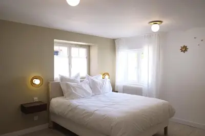 Un ou plusieurs lits dans un hébergement de l'établissement La Petite Maison