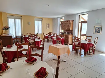 Restaurant ou autre lieu de restauration dans l'établissement hotel Loriot