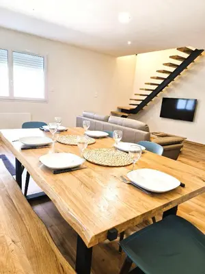Coin salon dans l'établissement Appartement 3 chambres