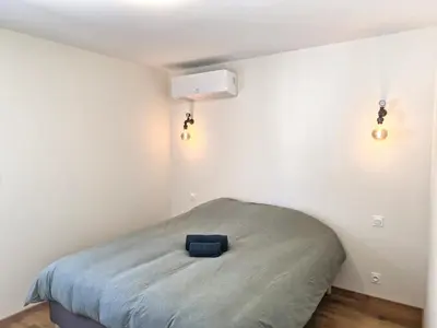 Un ou plusieurs lits dans un hébergement de l'établissement Appartement 3 chambres