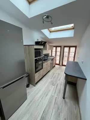 Cuisine ou kitchenette dans l'établissement L'appart des vignes