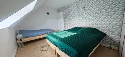 Un ou plusieurs lits dans un hébergement de l'établissement Gîte du Chaudron