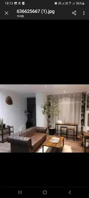 Coin salon dans l'établissement Anna Home