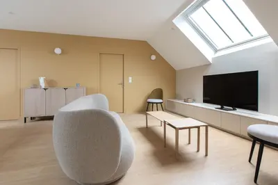 Télévision ou salle de divertissement dans l'établissement Les Clavendiers - Le Refuge