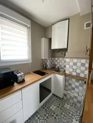 Cuisine ou kitchenette dans l'établissement Le Cosy