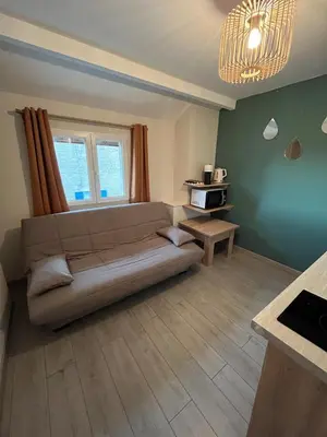 Coin salon dans l'établissement Appartement indépendant