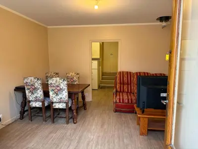Coin salon dans l'établissement Logement des deux ponts